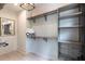 Custom walk-in closet featuring ample shelving, hanging rods, and storage solutions at 3960 Clairmont Rd # 2, Chamblee, GA 30341