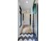 Inviting entryway featuring stylish tile flooring and a modern front door with a glass panel at 3960 Clairmont Rd # 2, Chamblee, GA 30341