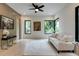 Bright living room with modern decor, hardwood floors, and large windows providing natural light at 3960 Clairmont Rd # 2, Chamblee, GA 30341