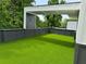 This rooftop deck features artificial turf and covered area for lounging or entertaining, great for city views at 3960 Clairmont Rd # 2, Chamblee, GA 30341