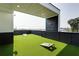 This rooftop deck features artificial turf and covered area for lounging or entertaining, great for city views at 3960 Clairmont Rd # 2, Chamblee, GA 30341