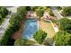A community park with a basketball court, playground, and green space for outdoor activities at 5995 Ettington Dr, Suwanee, GA 30024