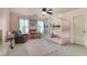 Charming bedroom featuring a unique playhouse bunk bed and playful decor at 5995 Ettington Dr, Suwanee, GA 30024