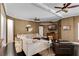 Inviting living room featuring hardwood floors, textured walls, and comfortable furniture at 5995 Ettington Dr, Suwanee, GA 30024