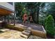Playground area with slide, climbing wall, swing and patio at 5995 Ettington Dr, Suwanee, GA 30024