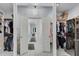 Spacious walk-in closet with custom shelving and organization systems at 5995 Ettington Dr, Suwanee, GA 30024