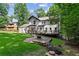 Two story home with a deck, and an outdoor fire pit at 4745 Masters Ct, Duluth, GA 30096