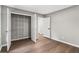 Bedroom with closet and wood-look flooring at 4745 Masters Ct, Duluth, GA 30096