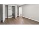 Bedroom with closet and wood-look flooring at 4745 Masters Ct, Duluth, GA 30096