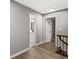 Second floor hallway with a partial railing, a doorway to a bathroom and other bedrooms at 4745 Masters Ct, Duluth, GA 30096