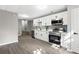 Kitchenette featuring white cabinets and modern finishes at 4745 Masters Ct, Duluth, GA 30096