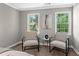 Bedroom sitting area with lots of light and comfortable seating at 4745 Masters Ct, Duluth, GA 30096