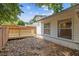 Backyard area featuring a new wooden deck, fence, and exterior of the home at 935 Bobcat Se Ct, Marietta, GA 30067