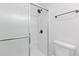 Bathroom features a walk-in shower with glass door and modern fixtures at 935 Bobcat Se Ct, Marietta, GA 30067