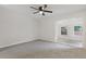 Spacious bedroom with a ceiling fan and view to a sunroom at 935 Bobcat Se Ct, Marietta, GA 30067