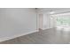 Well-lit living room area with a view of the backyard through French doors, offering an open layout at 935 Bobcat Se Ct, Marietta, GA 30067