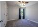 Bedroom with a gray carpet, light gray walls, and a ceiling fan at 108 Spring View Br, Dallas, GA 30157