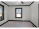 Cozy bedroom featuring neutral carpet, a ceiling fan, and ample natural light at 391 S Bend Se Ave, Atlanta, GA 30315