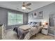 Bedroom with neutral walls, a ceiling fan, and a window with blinds at 2429 Brookgreen Nw Commons, Kennesaw, GA 30144