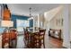 Spacious dining area with natural light, hardwood floors, and staircase access to the upper level at 2429 Brookgreen Nw Commons, Kennesaw, GA 30144