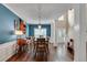 Elegant dining space showcasing hardwood floors, traditional furnishings, and direct access to the entry at 2429 Brookgreen Nw Commons, Kennesaw, GA 30144