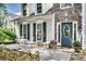Beautiful home with a stone facade, lovely front patio, and inviting curb appeal, perfect for relaxing outdoors at 2429 Brookgreen Nw Commons, Kennesaw, GA 30144