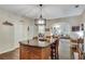 Spacious kitchen with a large center island for casual dining and connecting to the living room at 2429 Brookgreen Nw Commons, Kennesaw, GA 30144
