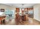 Well-appointed kitchen featuring an island with seating, stainless steel appliances, and access to an outdoor deck at 2429 Brookgreen Nw Commons, Kennesaw, GA 30144