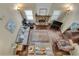 Open living room featuring hardwood floors, a stone fireplace, and lots of natural light at 2429 Brookgreen Nw Commons, Kennesaw, GA 30144