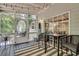 Relaxing screened porch with a ceiling and stylish furniture, perfect for outdoor living at 2429 Brookgreen Nw Commons, Kennesaw, GA 30144