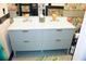 Elegant bathroom vanity features dual sinks, stylish hardware, and unique wallpaper at 3236 Jonesboro Rd, Atlanta, GA 30354