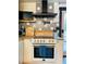 Well-equipped kitchen with modern appliances, stylish backsplash, and wood countertops at 3236 Jonesboro Rd, Atlanta, GA 30354