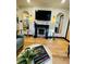 Stylish living room features a decorative fireplace, modern lighting, and comfortable seating at 3236 Jonesboro Rd, Atlanta, GA 30354