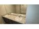 Bathroom featuring a double sink vanity with granite countertop and a large mirror at 3484 Enterkin Ln, Atlanta, GA 30349