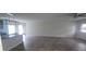 Open concept living room featuring neutral walls and modern wood-look flooring at 3484 Enterkin Ln, Atlanta, GA 30349