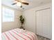 Bright bedroom features a ceiling fan, closet, and luxury vinyl plank flooring at 299 Fletcher Sw St, Atlanta, GA 30315