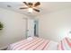 Bright bedroom features a ceiling fan, closet, and luxury vinyl plank flooring at 299 Fletcher Sw St, Atlanta, GA 30315