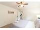 Bright bedroom features a ceiling fan, neutral walls, and luxury vinyl plank flooring at 299 Fletcher Sw St, Atlanta, GA 30315