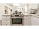 Well-equipped kitchen with a stainless steel range and open floor plan for easy flow to the living spaces at 299 Fletcher Sw St, Atlanta, GA 30315