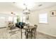 Bright, open living space combining living, dining, and kitchen areas for a modern feel at 299 Fletcher Sw St, Atlanta, GA 30315