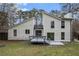Well-maintained backyard with deck, mature trees, offering a private outdoor retreat at 5444 Wylstream, Norcross, GA 30093