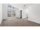 Spacious bedroom with plush carpet, ample natural light, and neutral paint colors at 5444 Wylstream, Norcross, GA 30093
