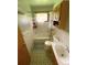 Full bathroom with a tub, shower, toilet, vanity, and window at 1024 Magnolia Dr, Smyrna, GA 30082