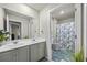 Clean bathroom features a double sink vanity and separate toilet and shower area at 450 Noblewood Dr, Mcdonough, GA 30252