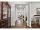 Welcoming foyer featuring hardwood floors, neutral paint, and an open view to the dining area at 450 Noblewood Dr, Mcdonough, GA 30252