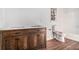 Bathroom featuring a wooden vanity with double sinks, white countertops, and tile flooring at 7935 Sweetwater Dr, Douglasville, GA 30135