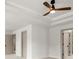 Modern bedroom with tray ceiling and stylish ceiling fan at 5125 Hyde Trl, Cumming, GA 30040