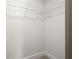 A minimalist closet with white wire shelving ready to be organized at 5125 Hyde Trl, Cumming, GA 30040