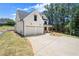 Charming two-story home with a two-car garage and a well-maintained lawn, ideal for comfortable living at 5125 Hyde Trl, Cumming, GA 30040