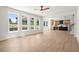 A spacious living room is enhanced by a modern open floor plan and light-filled windows at 5125 Hyde Trl, Cumming, GA 30040